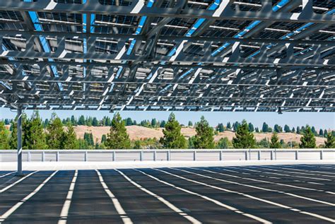 Solar Panels Installed As Solar Canopy On Top Of Parking Garage Stock