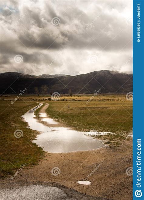 Wet Dirt Road After Storm Stock Photo Image Of Field 125695350