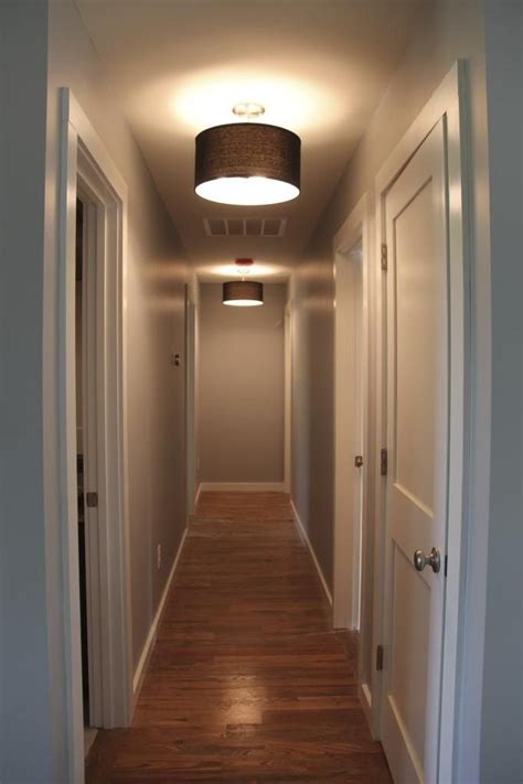Hang a shallow fixture in a low corridor. Hallway light fixtures | Hallway light fixtures, Hallway ...