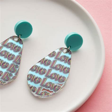 sterling silver iridescent love is love drop earrings by the ting knot