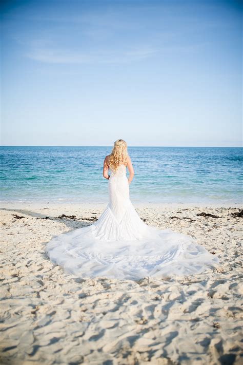Click here to find out if we are visiting near you! Bahamas Beach Weddings: Michaela + Ryan's Chic Vintage Wedding