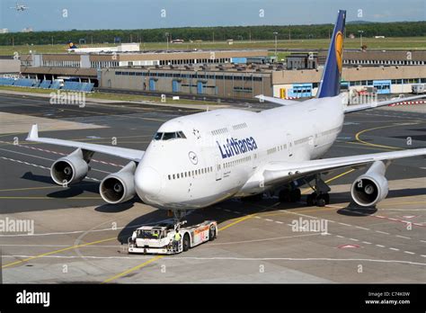 Lufthansa Boeing 747 Jumbo Jet Escorted To A Gate At Frankfurt Main