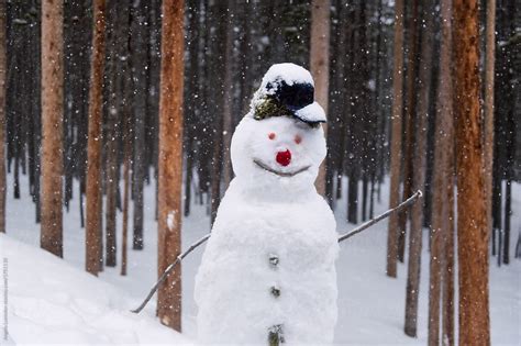 Snowman Standing In Snowy Conditions By Stocksy Contributor Angela