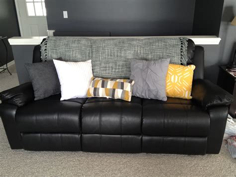 Lighten Up A Black Leather Couch With Bright Pillows And A Th