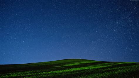 Green Grass Field Over The Horizon During Nighttime Hd Wallpaper
