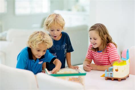 Children Playing Board Game Stock Photo Image Of Lifestyle Siblings