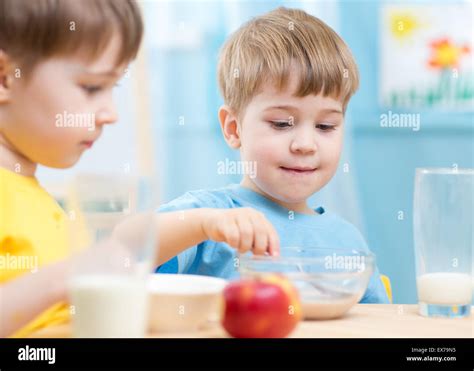 Children Eat Healthy Food At Home Or Kindergarten Stock Photo Alamy
