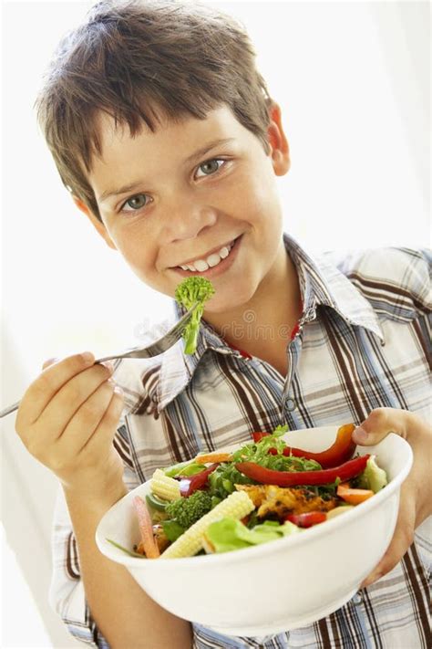 Young Boy Eating A Healthy Salad Stock Image Image Of Healthy