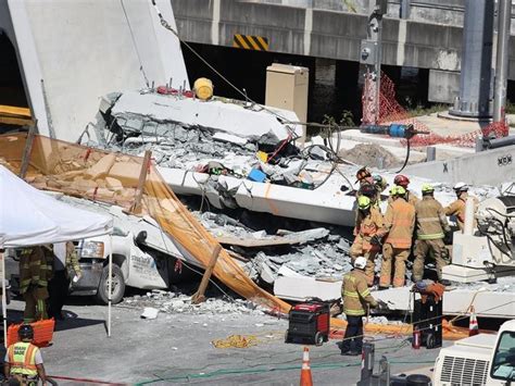 Emergency services were at the scene and people were seen being stretchered onto ambulances. Six dead in pedestrian bridge collapse at Florida International Univ. in Miami, authorities say