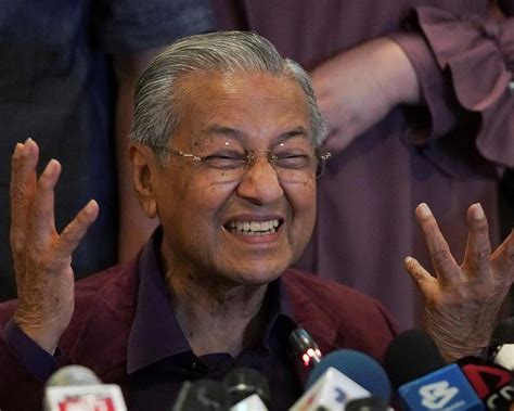 Mahathir's honeymoon fades as old ways resurface premium. Race to form Malaysia gov't heats up, with eyes on ...
