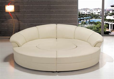 White Leather Round Bed With Curvy White Headboard Added By Curvy Floor