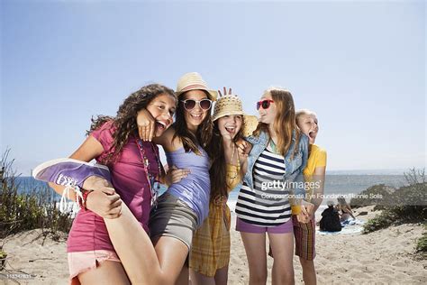 Teenage Girls Having Fun On The Beach Photo Getty Images