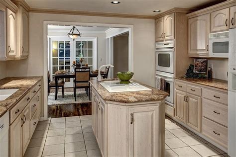 Oak countertops on white cabinets in a kitchen pantry accented with nickel pulls and a gray and white speckled backsplash finish. 25+ Best Collection Whitewash Oak Cabinets | Freestanding kitchen island, Whitewash kitchen ...