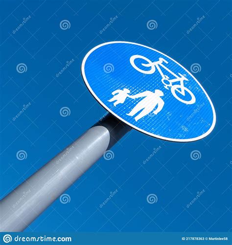 Pedestrian And Cyclist Path Road Sign Against A Clear Blue Sky