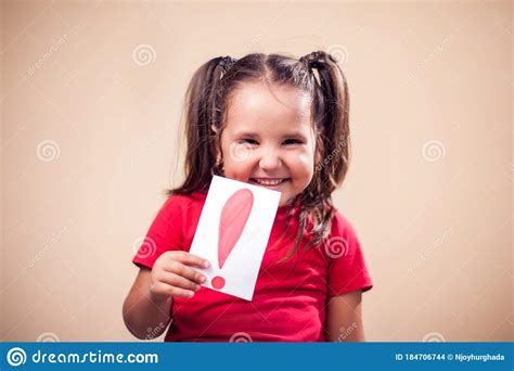 A Portrait Of Kid Girl Holding Card With Exclamation Point Childhood