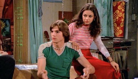 mila kunis in character with ashton kutcher jackie burkhart and michael kelso that 70 s show