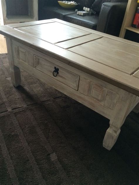 Ship lap construction with a lock and key. Old pine coffee table made shabby chic! White washed legs ...