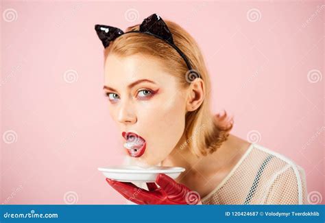 milk in hand of cat woman milk and cat woman on pink background stock image image of pink