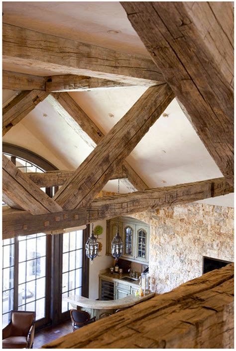 The Interior Of A Rustic Home With Exposed Wood Beams