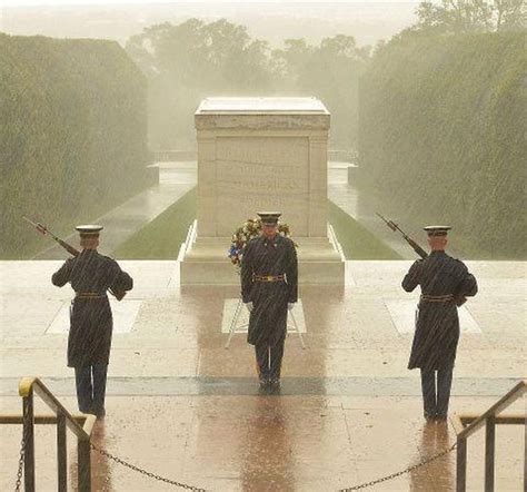 Three Soldiers Of The 3rd Infantry Regiment Stood Guard At The Tomb Of The Unknown Soldier As