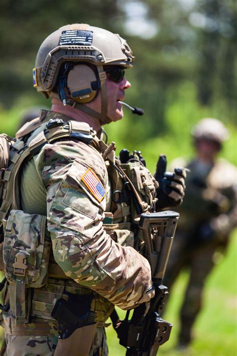 A Us Army National Guard Green Beret Soldier Trains A Group Of