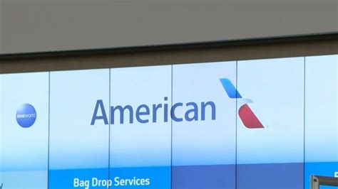 Watch Cbs Evening News American Airlines Cancels Hundreds More Flights