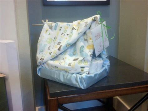For a more modern twist, why not throw a mustache baby shower? Diaper cake in the shape of a tent. Camping theme baby ...