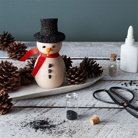 This little diy scrapwood snowman family makes my heart warm like hot chocolate! DIY Wooden Snowman Kit | Wooden snowman, Snowman kit, Wooden diy