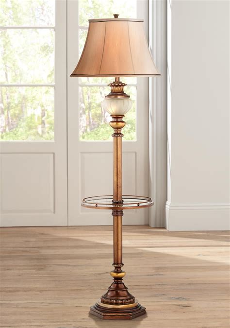 Both handsome and inviting, this floor lamp from pacific coast stands out with a metallic luster amid traditional design elements. Kathy Ireland 65" High Night Light Glass Tray Floor Lamp ...