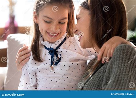 Close Up Happy Laughing Mother And Daughter Hugging Having Fun Stock