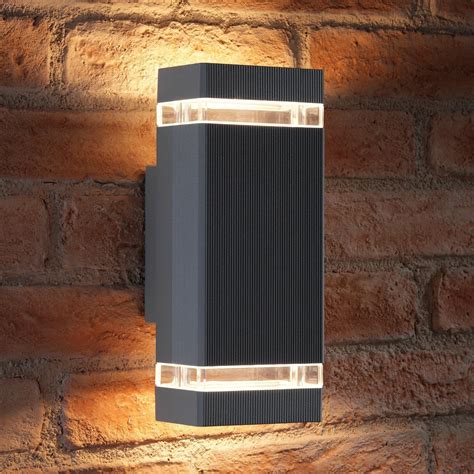 The wall lamp has two openings one at the bottom and one at the top that forms a cone of light upward and. Auraglow Large Outdoor Double Up & Down Wall Light ...