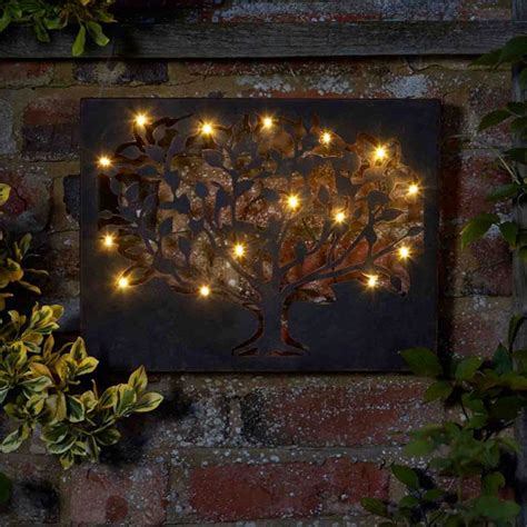 Consider purchasing multiple sets to fill large wall space, or hang the small, medium and large starburst wall art pieces for a truly spectacular and modern display. Customer Reviews for Smart Garden Silhouette Tree LED Wall Art 12 LED