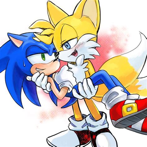 An Image Of Sonic And Tails Kissing Each Other