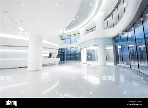 Futuristic Modern Office Building Interior In Urban City Stock Photo