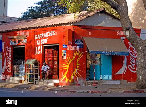 Travel Senegal Dakar Local Man Corner Store And Shopkeeper Stock