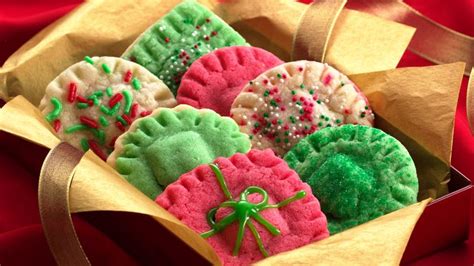 Have fun with easy icing and sugar cookies. Christmas Surprise Sugar Cookies recipe from Betty Crocker