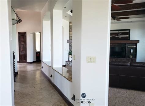 4 harmonious color palette warm neutrals in a similar tone to the oak. Travertine tile floor with off-white warm greige walls and dark wood trim and doors. Kylie M ...