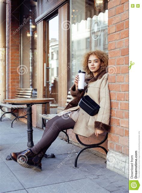 Search breaking news photos from getty images' unparallelled editorial gallery. Young Pretty African American Women Drinking Coffee ...