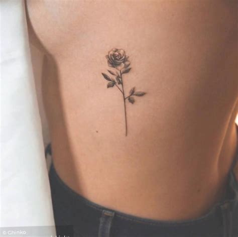 Pink Rose Dainty Hand Tattoo 23 Chic Small Rose Tattoos For Women