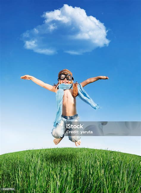 Happy Kid Jumping Outdoors Stock Photo Download Image Now Active