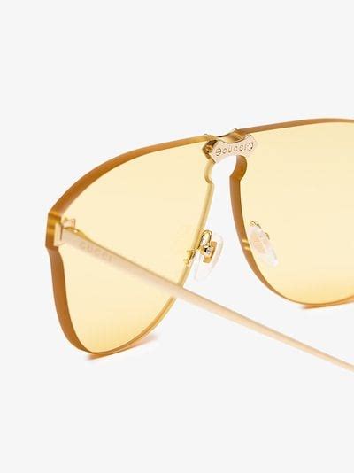 gucci eyewear yellow aviator frame rimless sunglasses browns