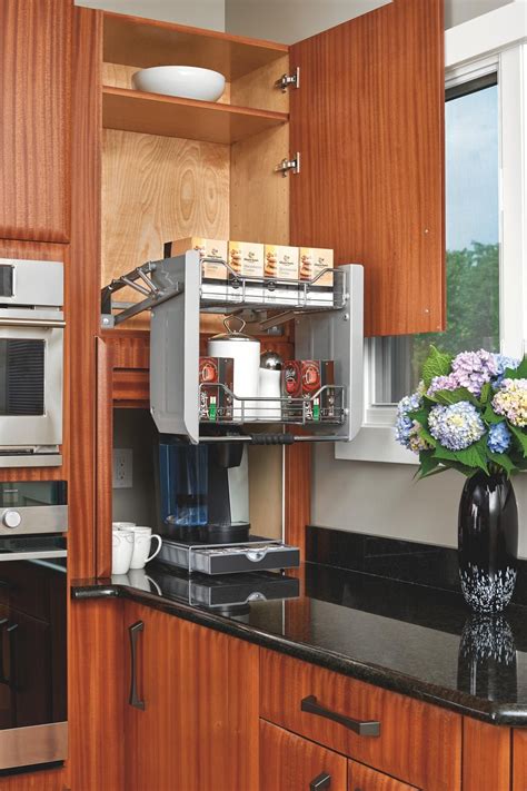 A small kitchen shelving unit is perfect if you only need a little extra kitchen storage, but a large organizational cabinet is exactly what you need for a great deal of added space. Pull-Down Shelf in Kitchen Cabinet | Upper kitchen ...