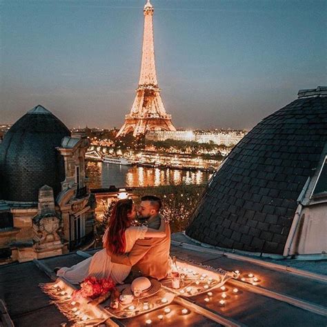 Romantic Evening For This Couple Enjoy Paris In The Evening From The