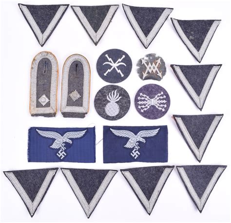 Grouping Of Luftwaffe Insignia Consisting Of Miss Matched Pair Of