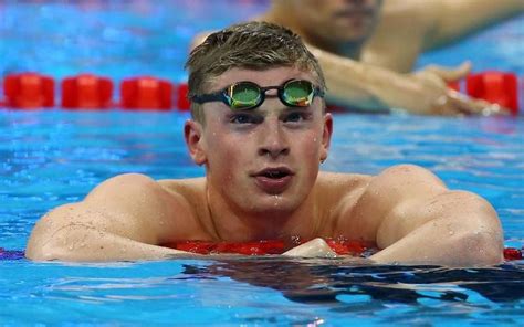 Britains Peaty Takes 100m Breaststroke Gold In Wr