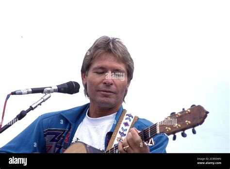 Singer John Denver Performs At An Earth Day Rally At The United States