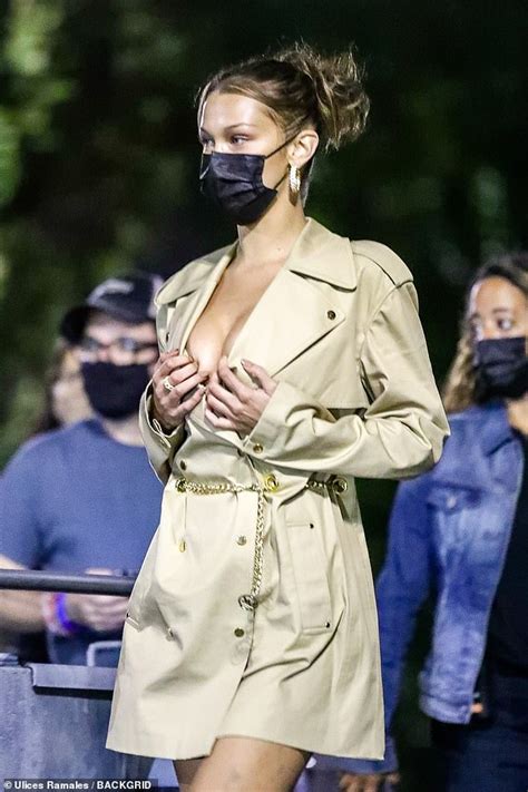 Bella Hadid Puts On A Very Busty Display In A Trench Coat Dress Daily Mail Online