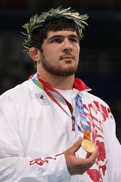 Khadjimourat Gatsalov Of Russia Displays His Gold Medal During
