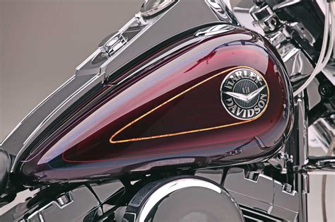 But, on a custom you will have to relocate that speedo, and i think you can only go so high on the front lift without raising the back of the tank also due to where it is bolted on, the pivot will cause the back to hit the frame. Heritage Softail & Softail Deluxe - Two Harleys, One Painter