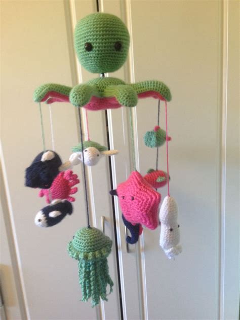 This pattern is a wonderful collaboration between alicia plummer and julie asselin hand dyed yarns for the pom pom quarterly blog! Crocheted Ocean Mobile for my niece's crib. Made from a ...